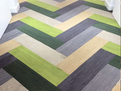 horizontal carpet tiles laid herringbone design